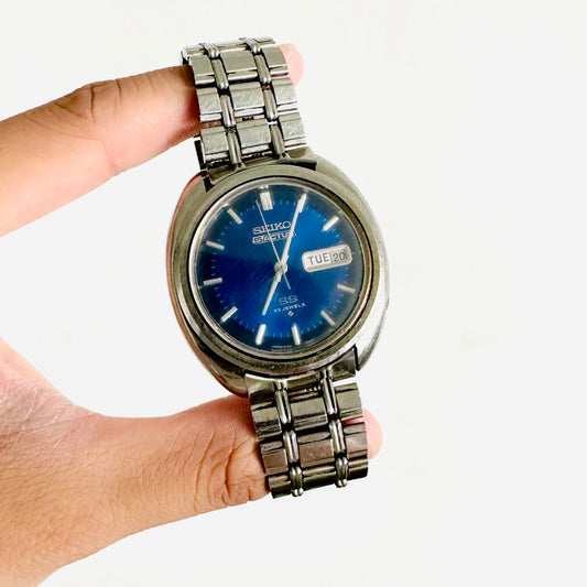 Seiko Men’s 5 Actus 6106-7470 Day Date Blue Dial Stainless Steel SS 21 Jewels Quartz 38MM Watch