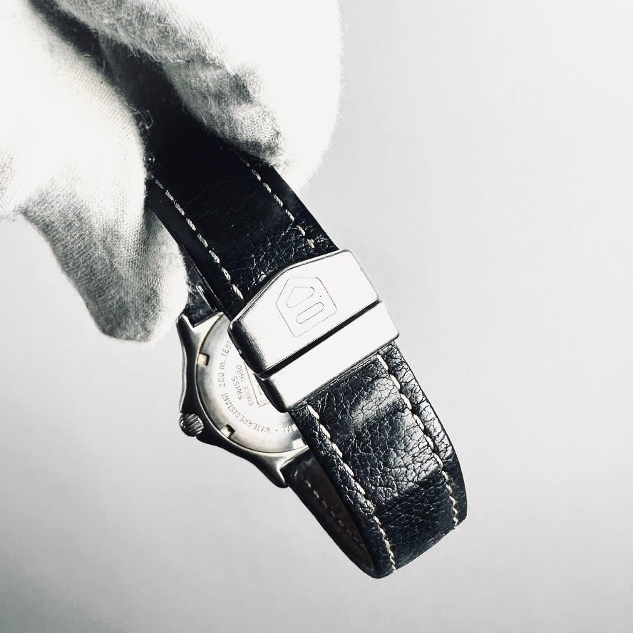 Tag Heuer Professional WI 1211 Black Dial Stainless Steel Black Leather Strap Quartz 34MM Watch