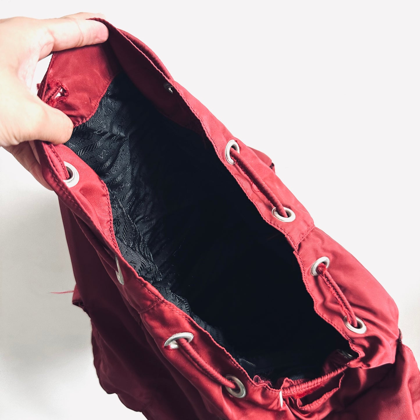 Prada Maroon Red Vela Monogram Logo Nylon & Leather Flap Backpack Drawstring Bag