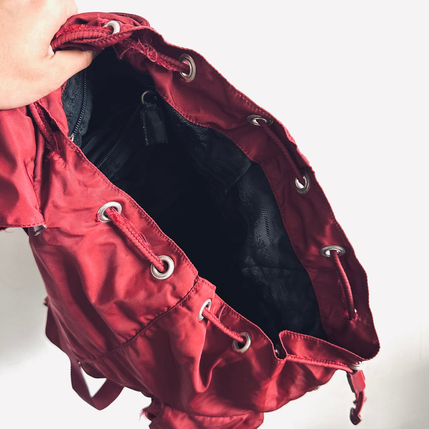 Prada Maroon Red Vela Monogram Logo Nylon & Leather Flap Backpack Drawstring Bag