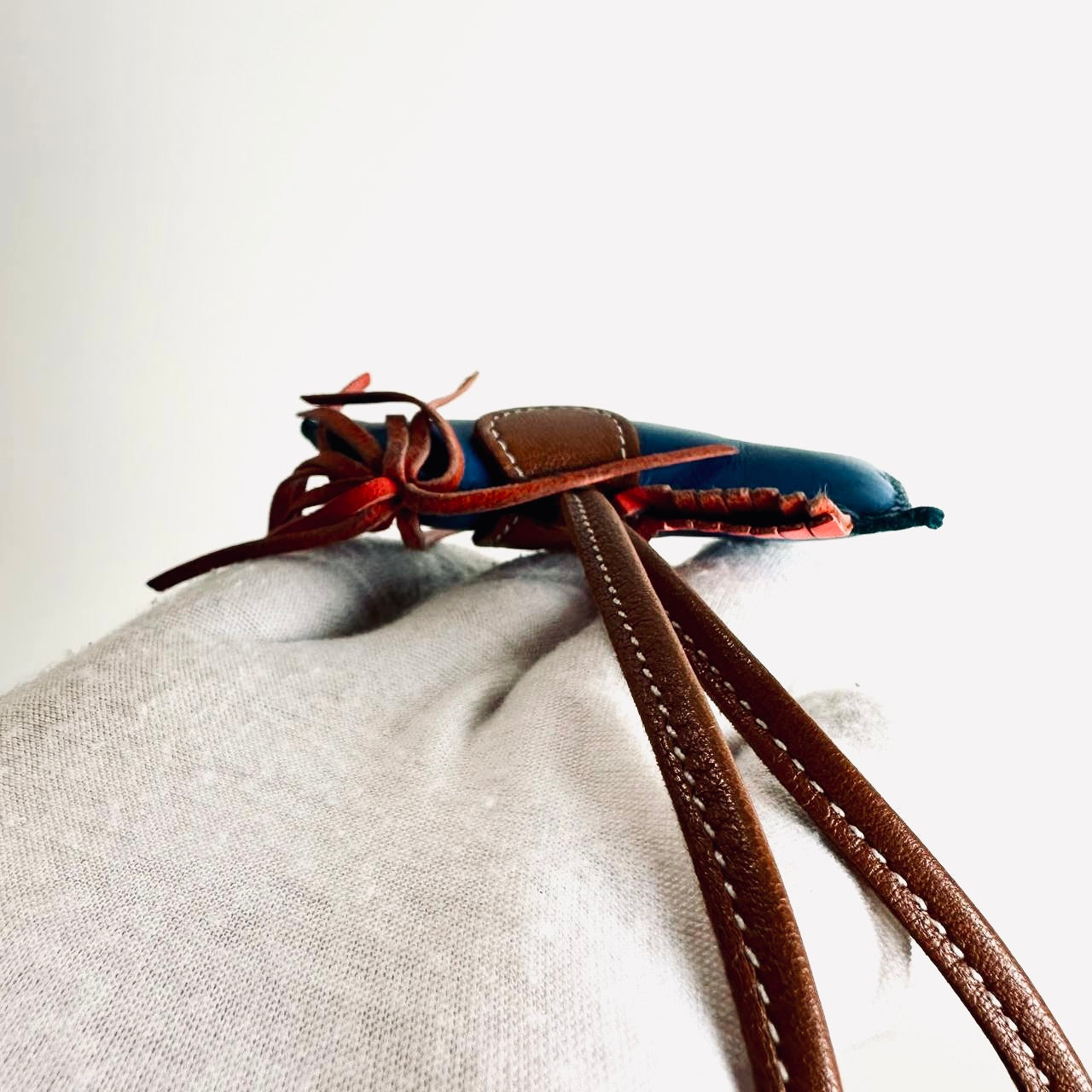 Hermes Rodeo PM Milo Lambskin Bag Charm Tri Colour Rouge Sellier / Bleu De France / Cornelian Feu