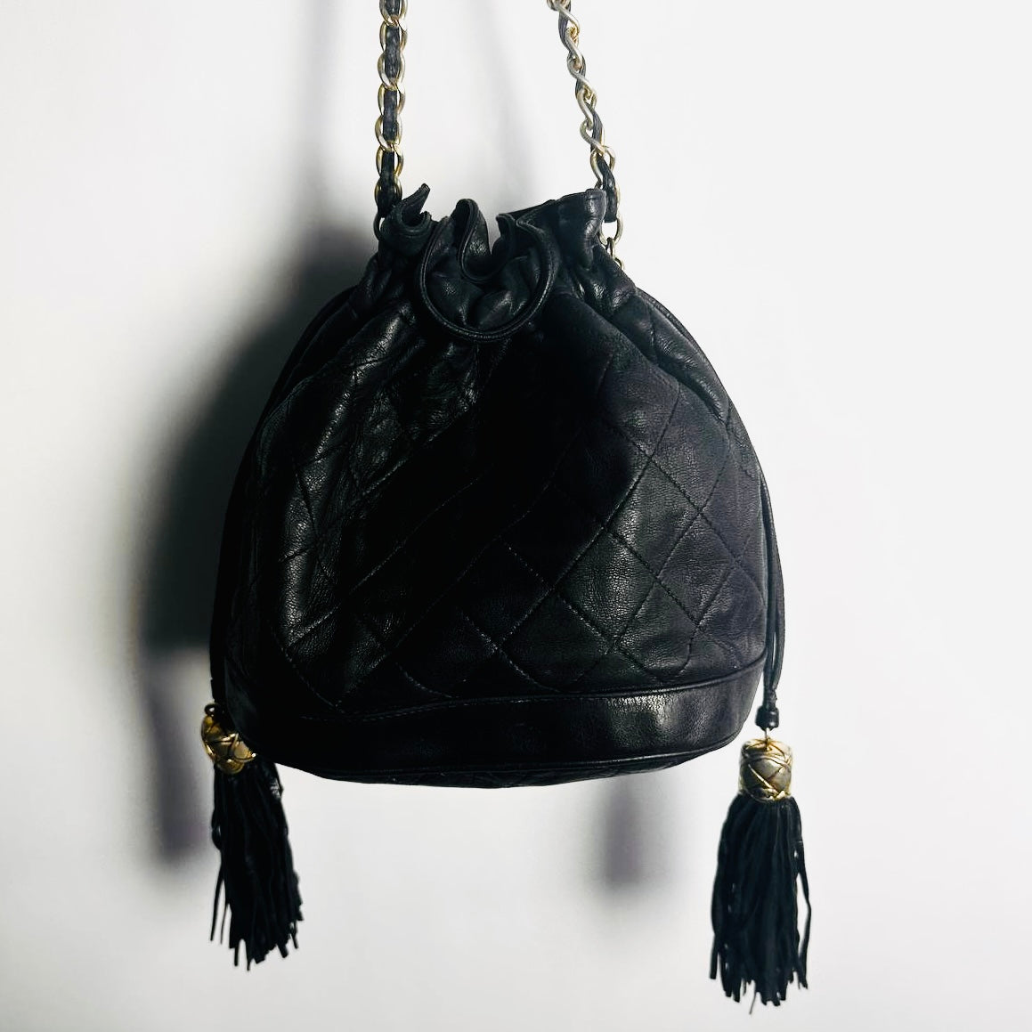 Chanel Black GHW CC Monogram Logo Quilted Lambskin Vintage Bucket Shoulder Sling Bag 1s With Double Tassels