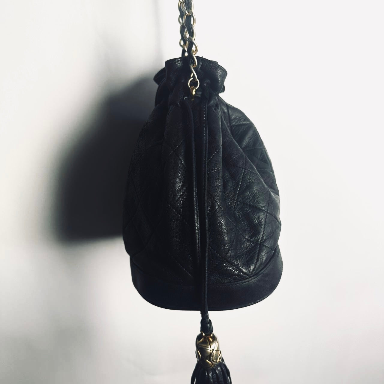 Chanel Black GHW CC Monogram Logo Quilted Lambskin Vintage Bucket Shoulder Sling Bag 1s With Double Tassels