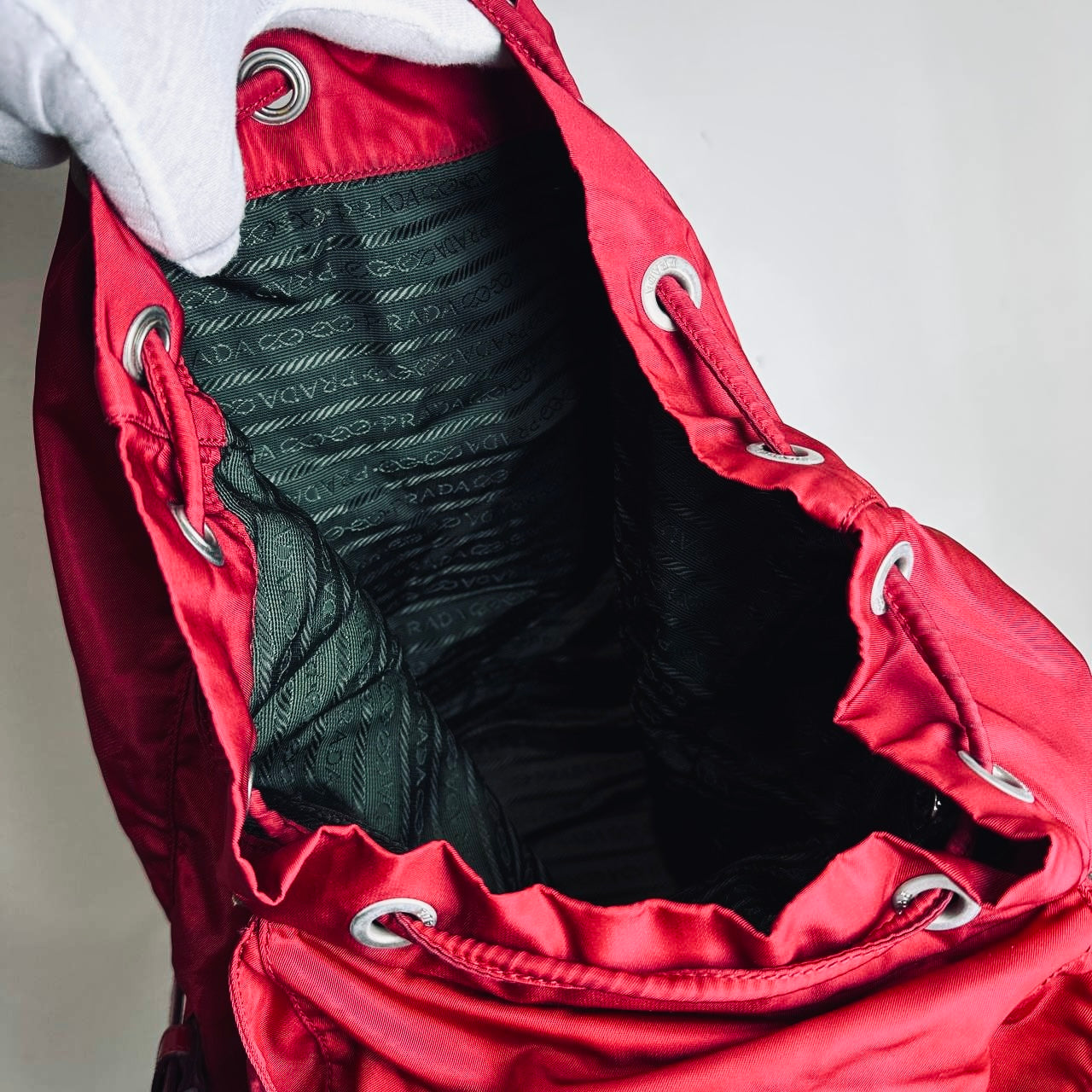 Prada Deep Red Tessuto Monogram Logo Nylon & Leather Flap Backpack Drawstring Bag