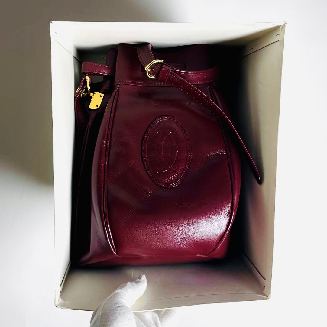 Cartier Mast / Must de Cartier Bucket Burgundy Maroon Red GHW Smooth Leather Shoulder Drawstring Bag