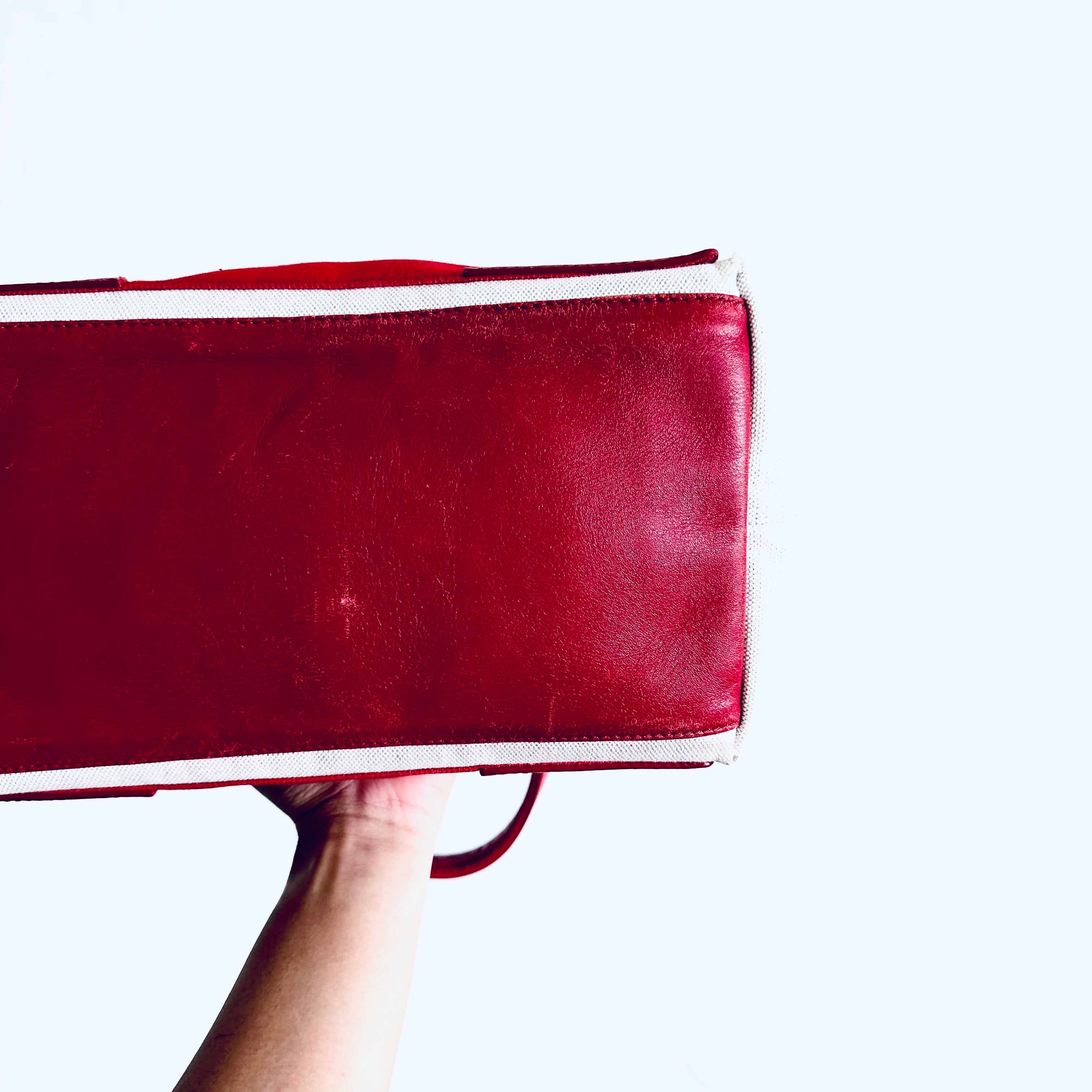 Red and sale white clutch bag