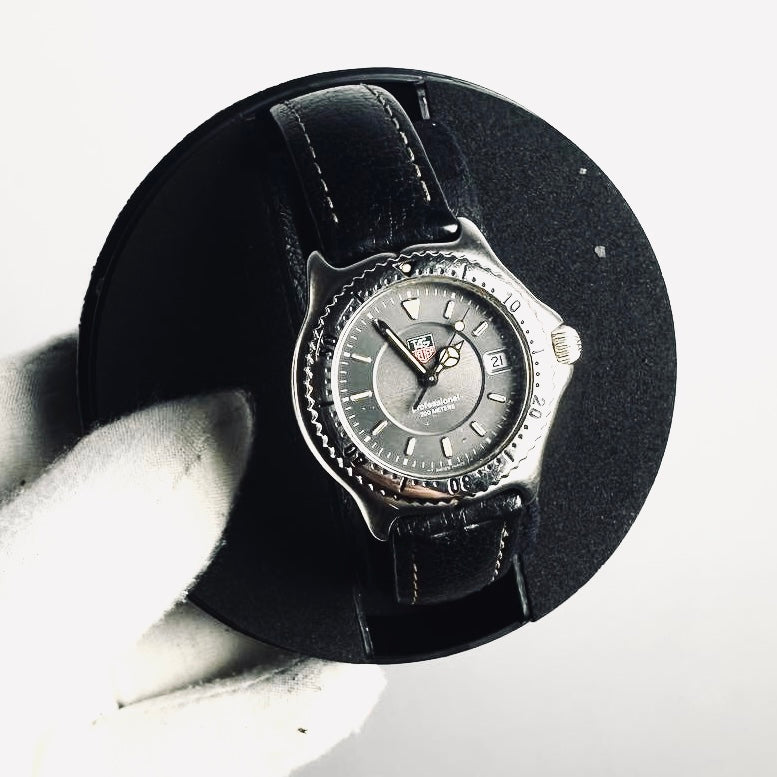 Tag Heuer Professional WI 1211 Black Dial Stainless Steel Black Leather Strap Quartz 34MM Watch