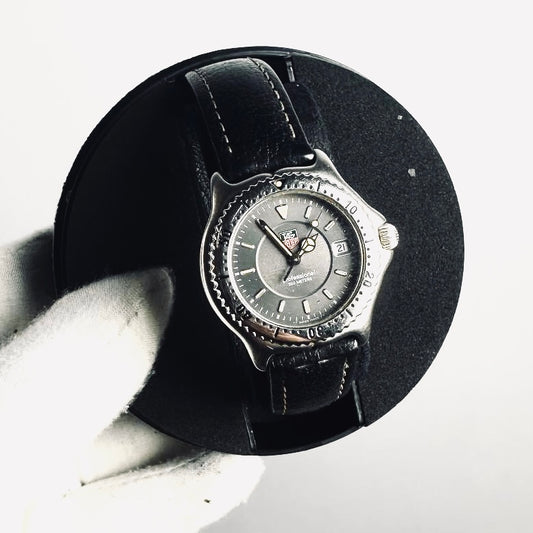 Tag Heuer Professional WI 1211 Black Dial Stainless Steel Black Leather Strap Quartz 34MM Watch