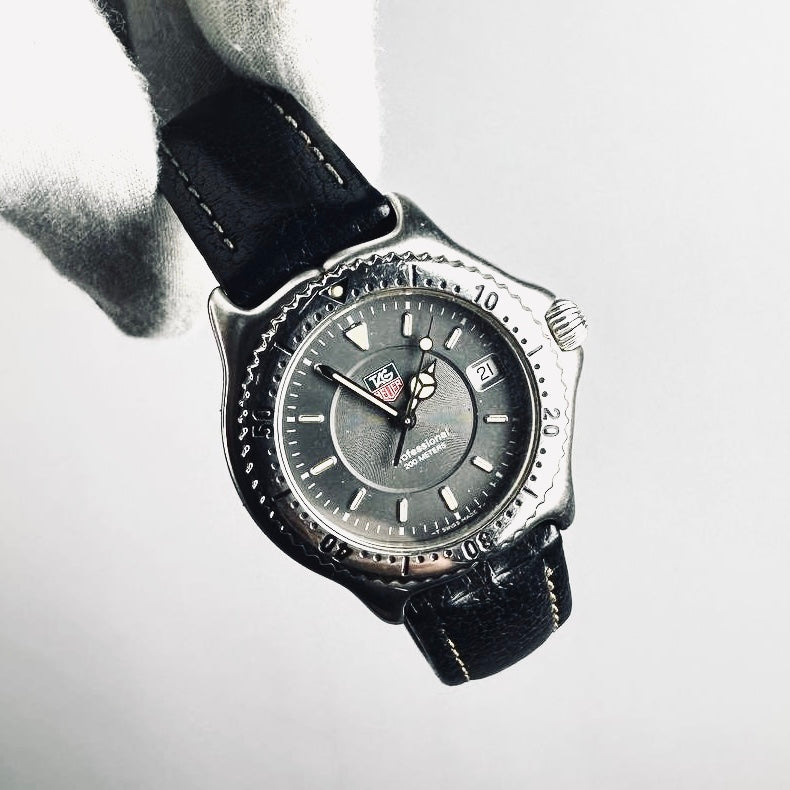 Tag Heuer Professional WI 1211 Black Dial Stainless Steel Black Leather Strap Quartz 34MM Watch