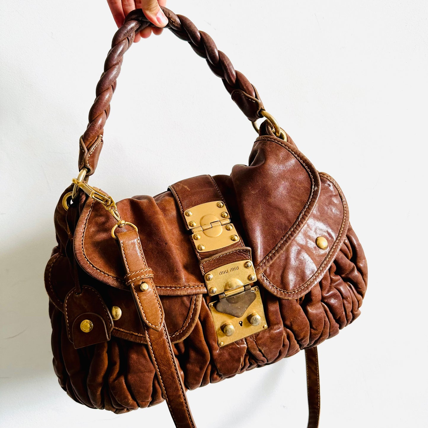 Miu Miu Caramel Brown GHW Matelasse Lux Leather Classic Logo 2-Way Bauletto Hobo Shopper Shoulder Baguette Sling Bag