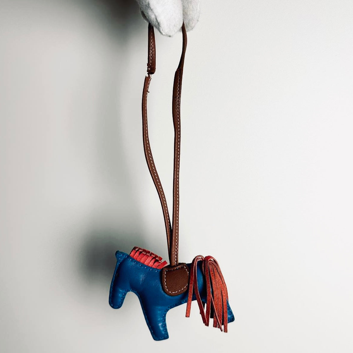 Hermes Rodeo PM Milo Lambskin Bag Charm Tri Colour Rouge Sellier / Bleu De France / Cornelian Feu