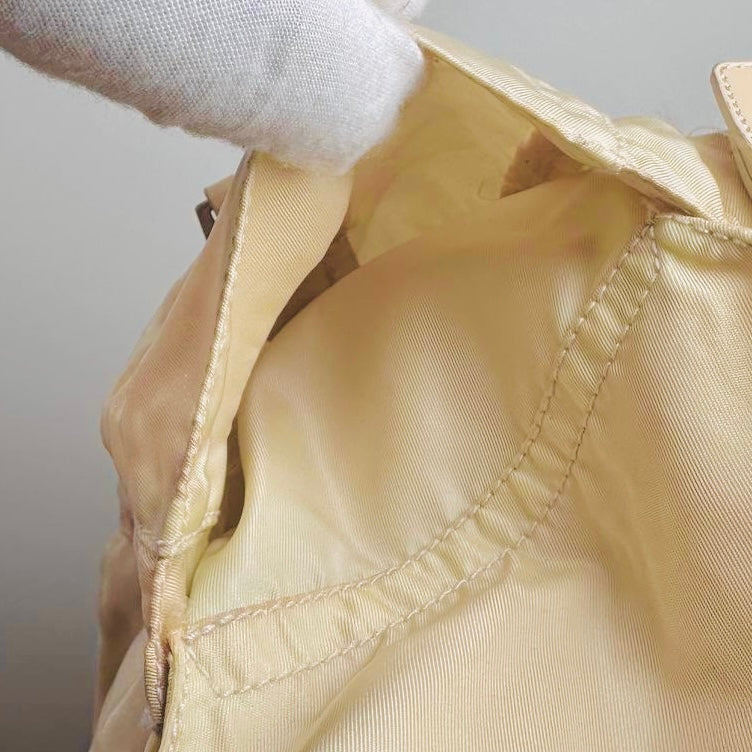 Prada Off White Tessuto Monogram Logo Nylon & Leather Backpack Flap Drawstring Bag