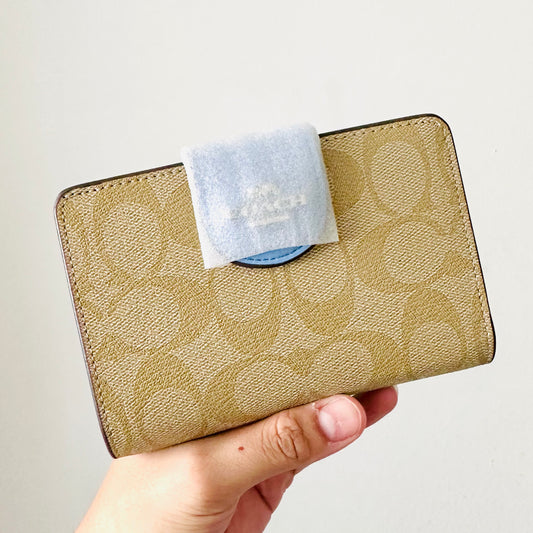 Coach Signature Monogram Canvas / Periwinkle Leather Medium Corner Zip Around Zippy Flap Compact Bifold Wallet