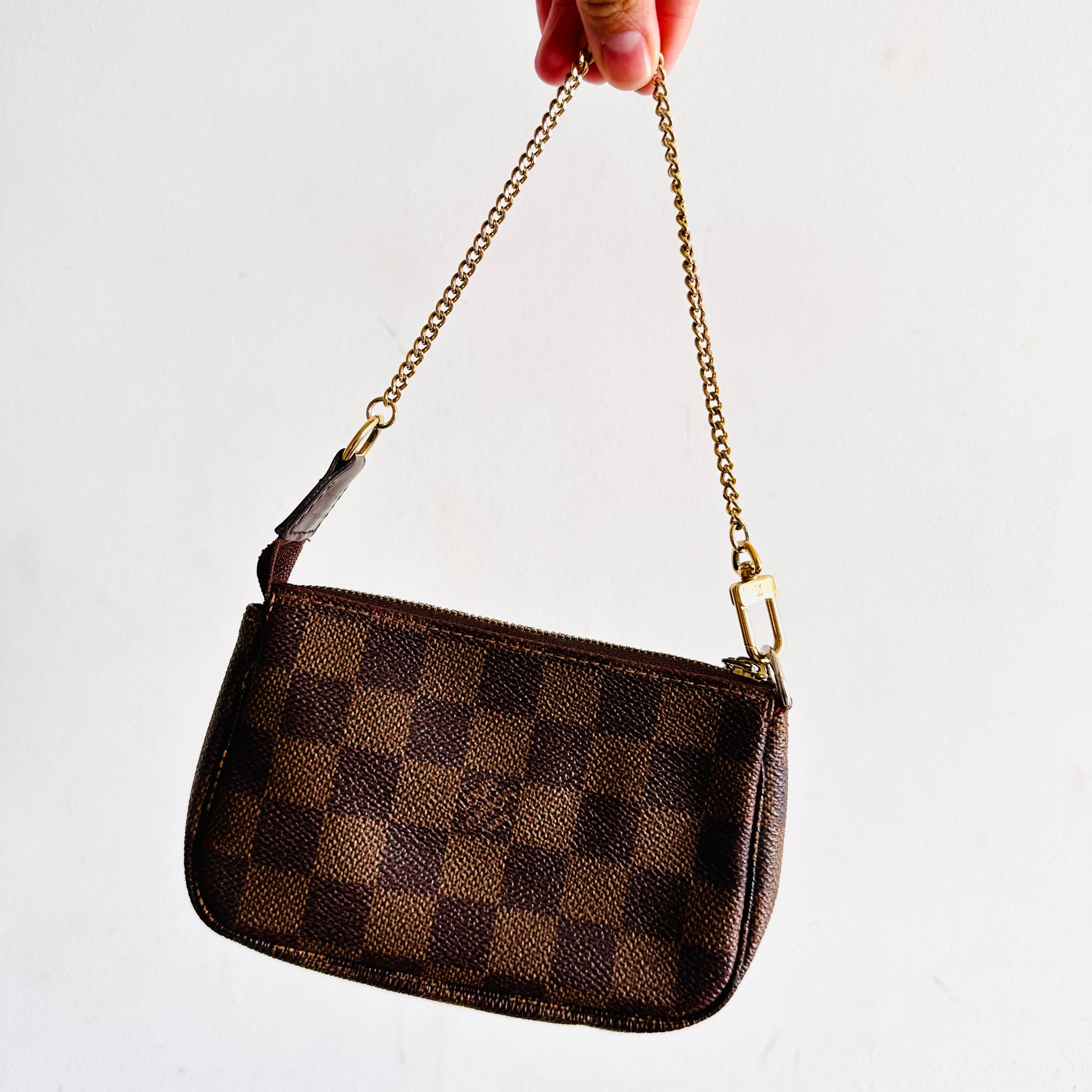 Mini pochette monogram discount or damier ebene