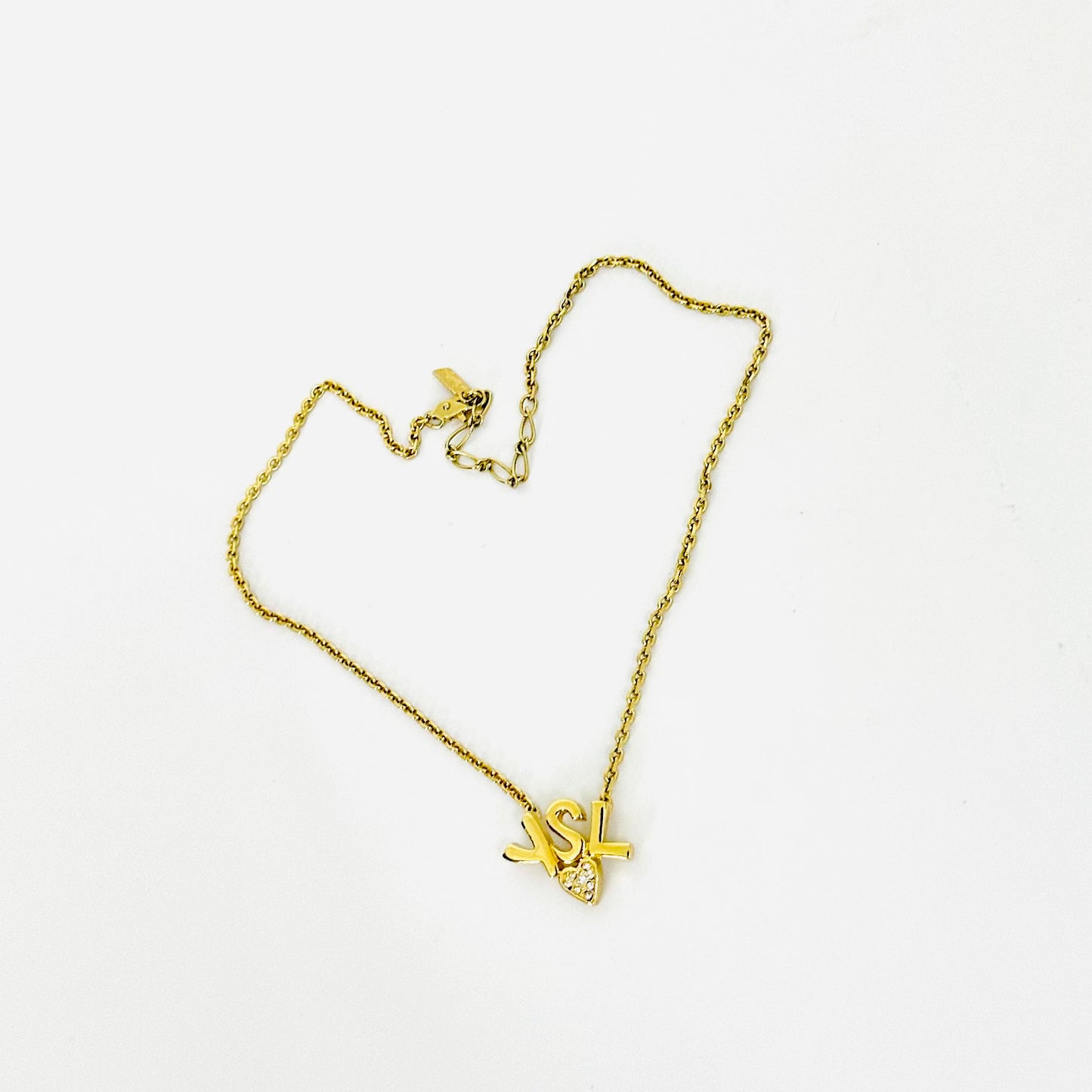 YSL Yves Saint Laurent Gold Monogram Logo & Crystal Heart Pendant Necklace