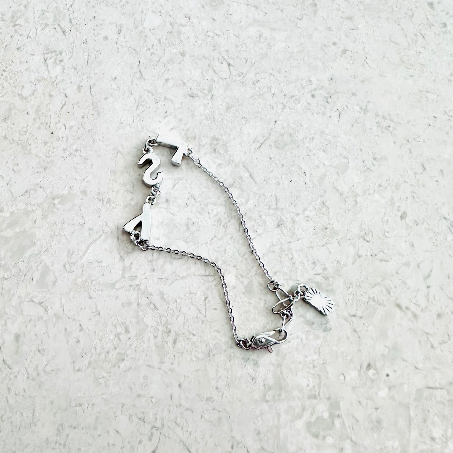 YSL Yves Saint Laurent Silver & Crystals Monogram Logo Chain Bracelet