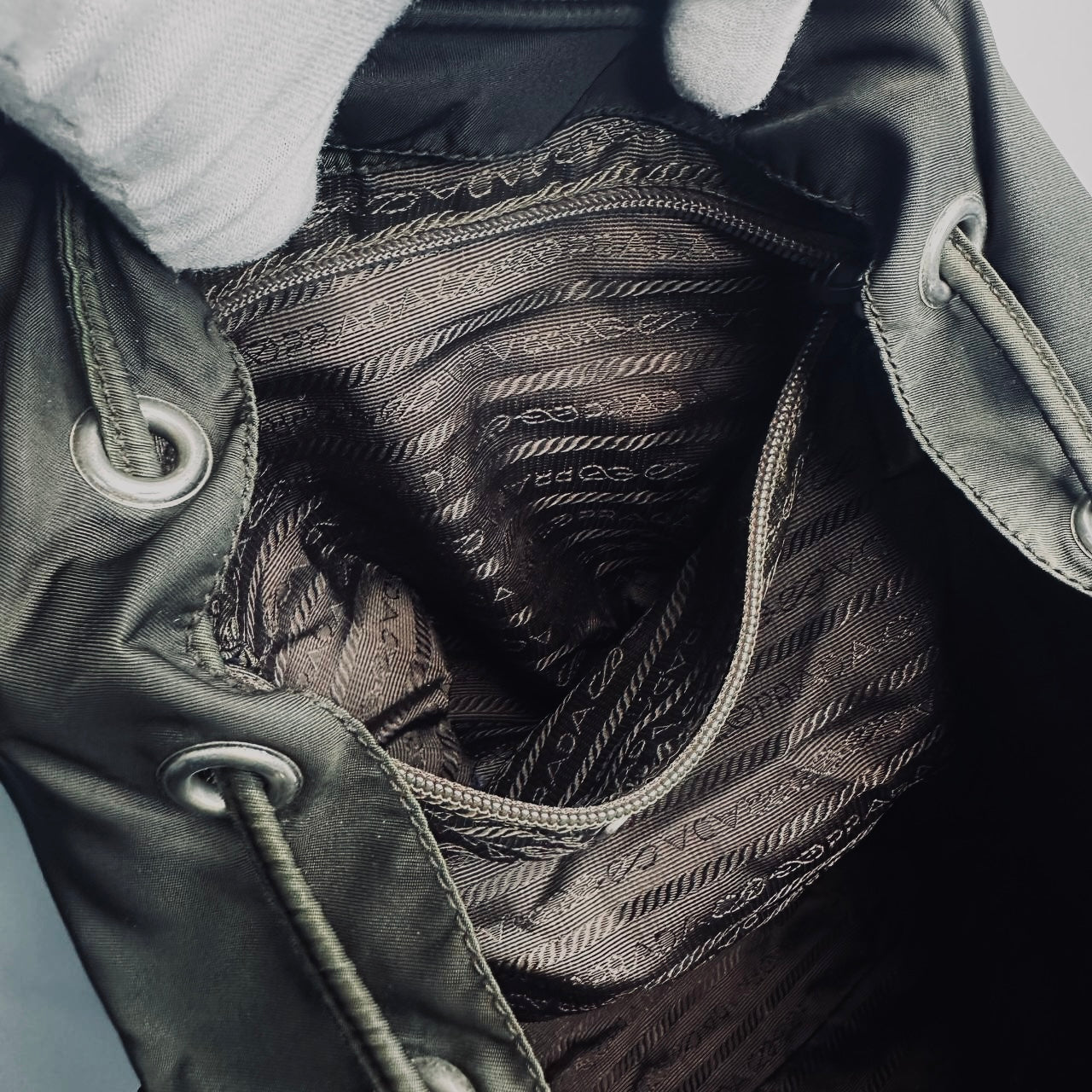 Prada Dark Khaki Classic Tessuto Monogram Logo Nylon & Leather Backpack Flap Drawstring Bag