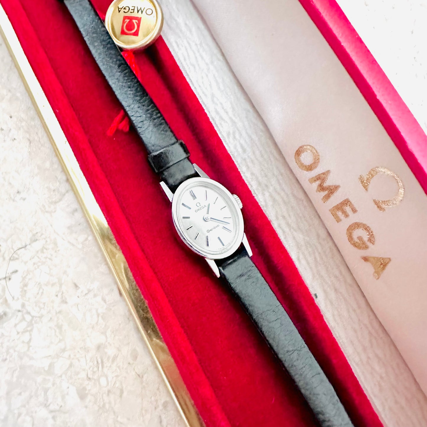 Omega Geneve White Oval Dial Black Leather Strap 16MM Mechanical Vintage Watch