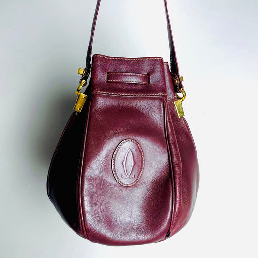 Cartier Mast / Must de Cartier Burgundy Maroon Red GHW Smooth Leather Bucket Shoulder Drawstring Bag